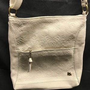 Ivory soft leather Sak purse. In excellent shape.